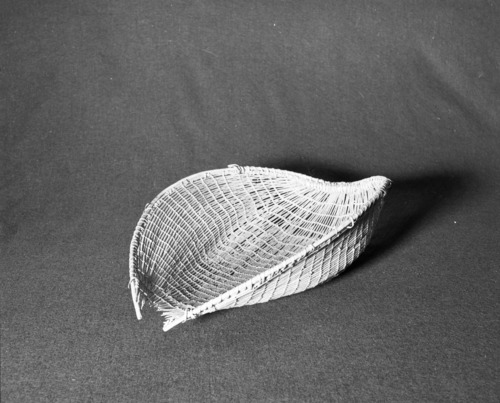 Marie Rozier Collection, Catalog No. 103. Object: Miwok sifting basket. Dimensions: 13 x 18". Materials: willow shoots, split willow shoots. Technology: plain twined, one row diagonal twining at end, up to right slant of turns. Appears to have remnants of soaproot juice stuck on. Technologically similar to Paiute specimens. Collection History: Belonged to Carmelita Ralph. Acquired from Louise Fuentes, her sister. Photographed by Michael Dixon in December 1982. Catalogued by Craig Bates and Barbara Beroza. Yosemite Collections, National Park Service.