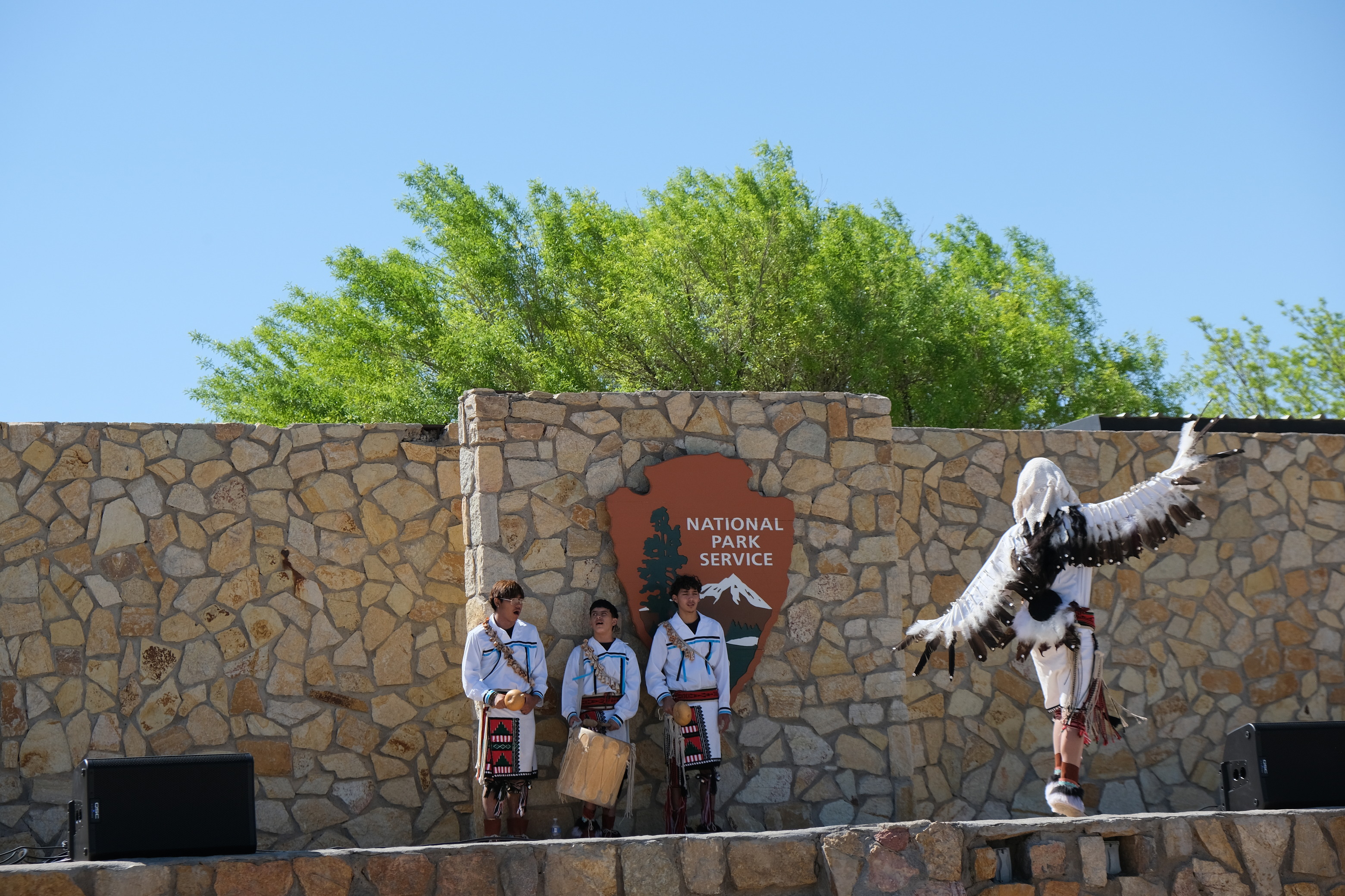 Dancers from Ysleta del Sur Social Dance perform on stage.