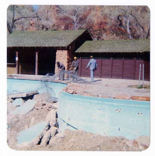 Workers during the destruction of the lodge pool and bathhouse.