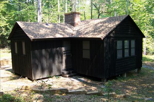 Rehabilitate historic cabin building 65 in camp Mawavi (Camp 2) at Prince William Forest Park in September 2011