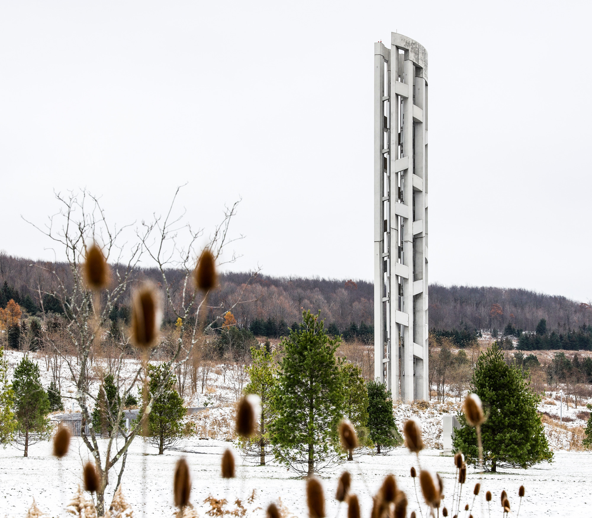 Snow laying on the ground near the Tower of Voices.
