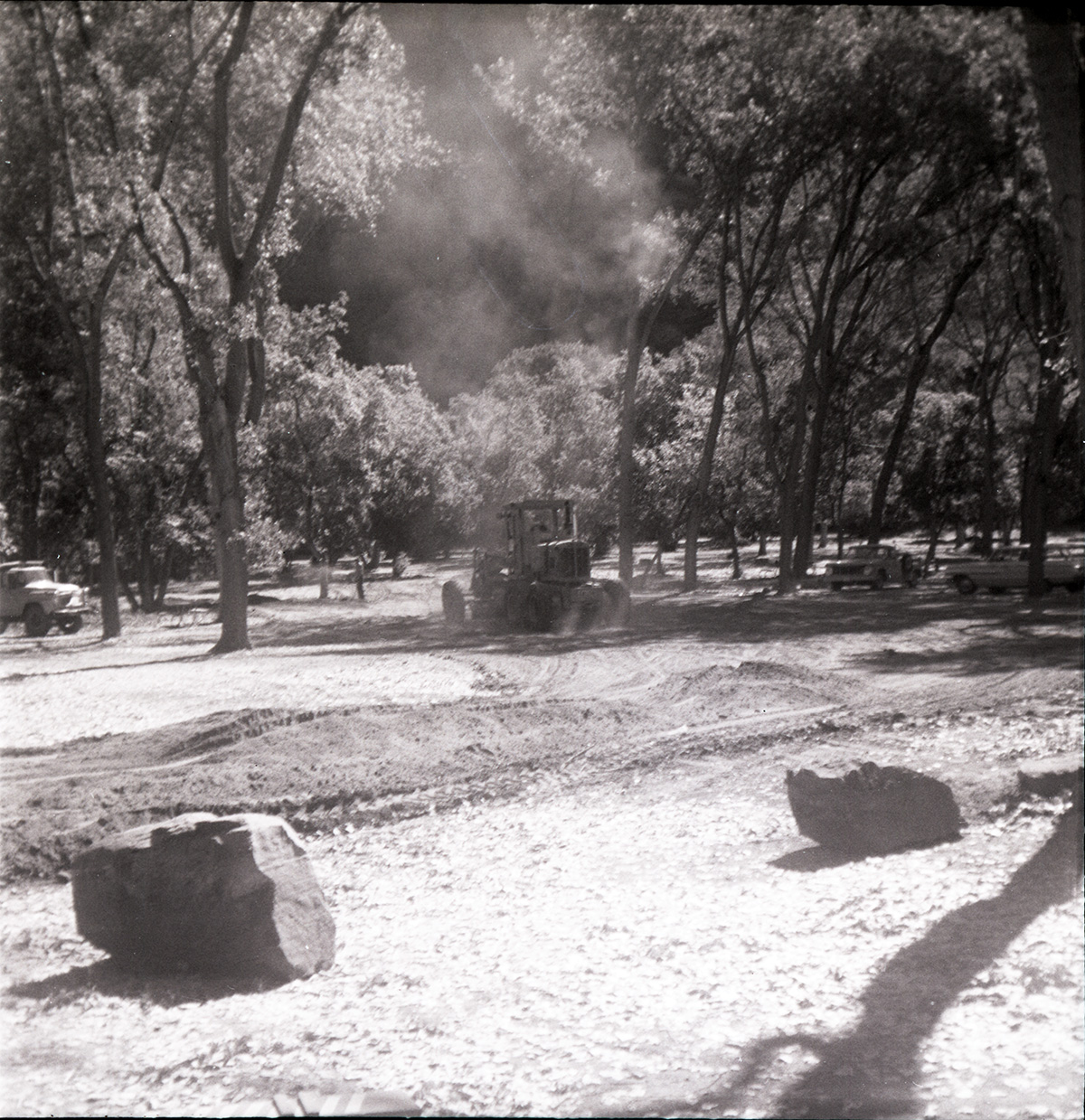 Tractor performing construction activities for the Grotto parking area.
