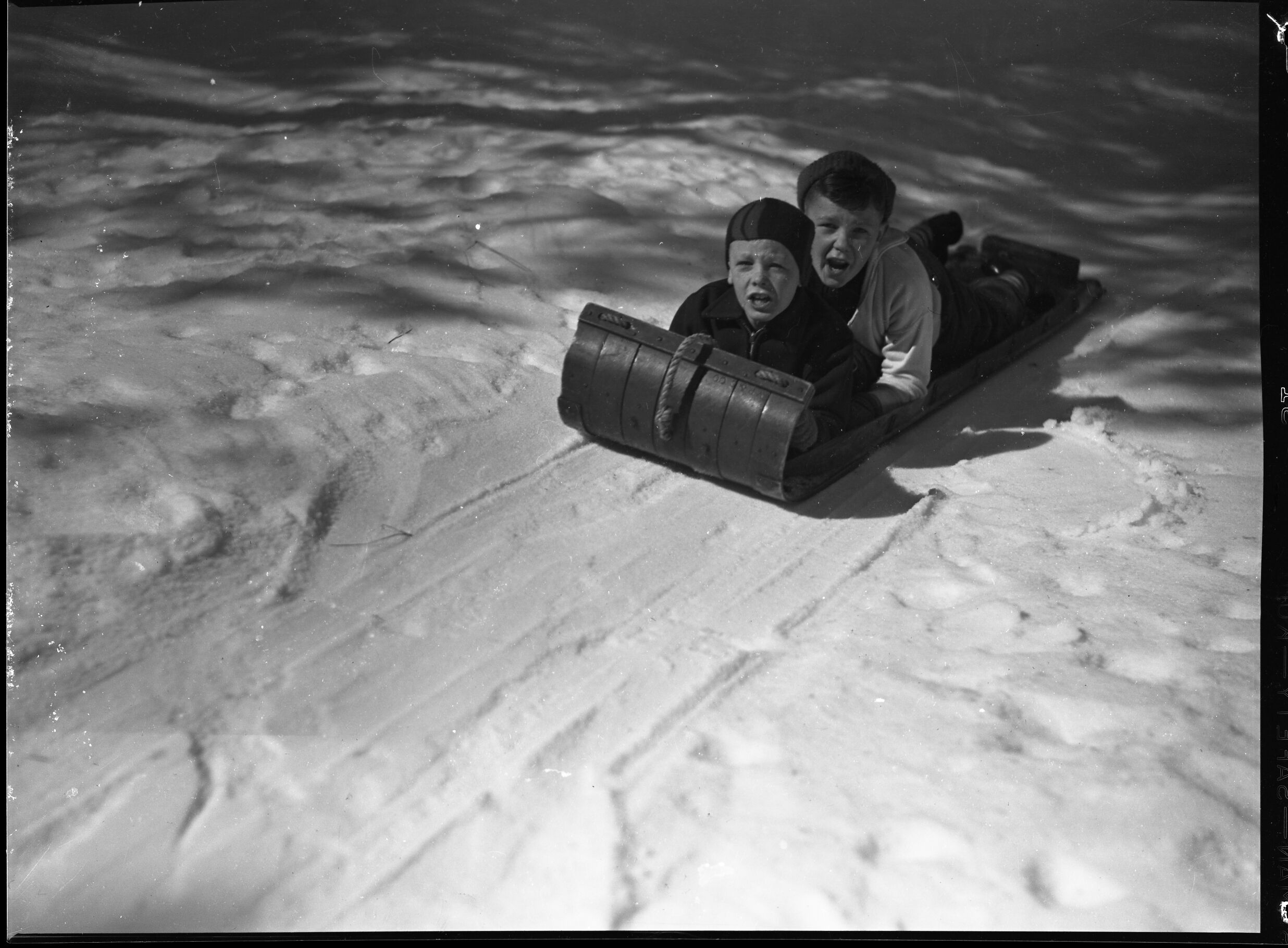 Top of Ash Can Slide, riders in motion