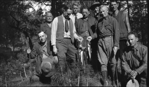 Horace Albright (3rd fm. lft), Don Tresidder (2nd fm. right) and fishing group