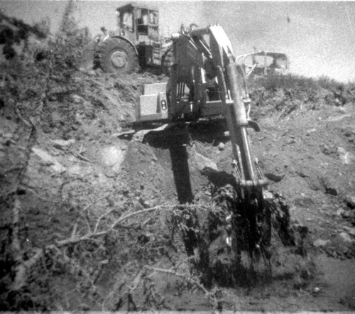 BW photos of rock slides in Kolob Canyons - 110mm. Trackhoe clearing rock slide debris.