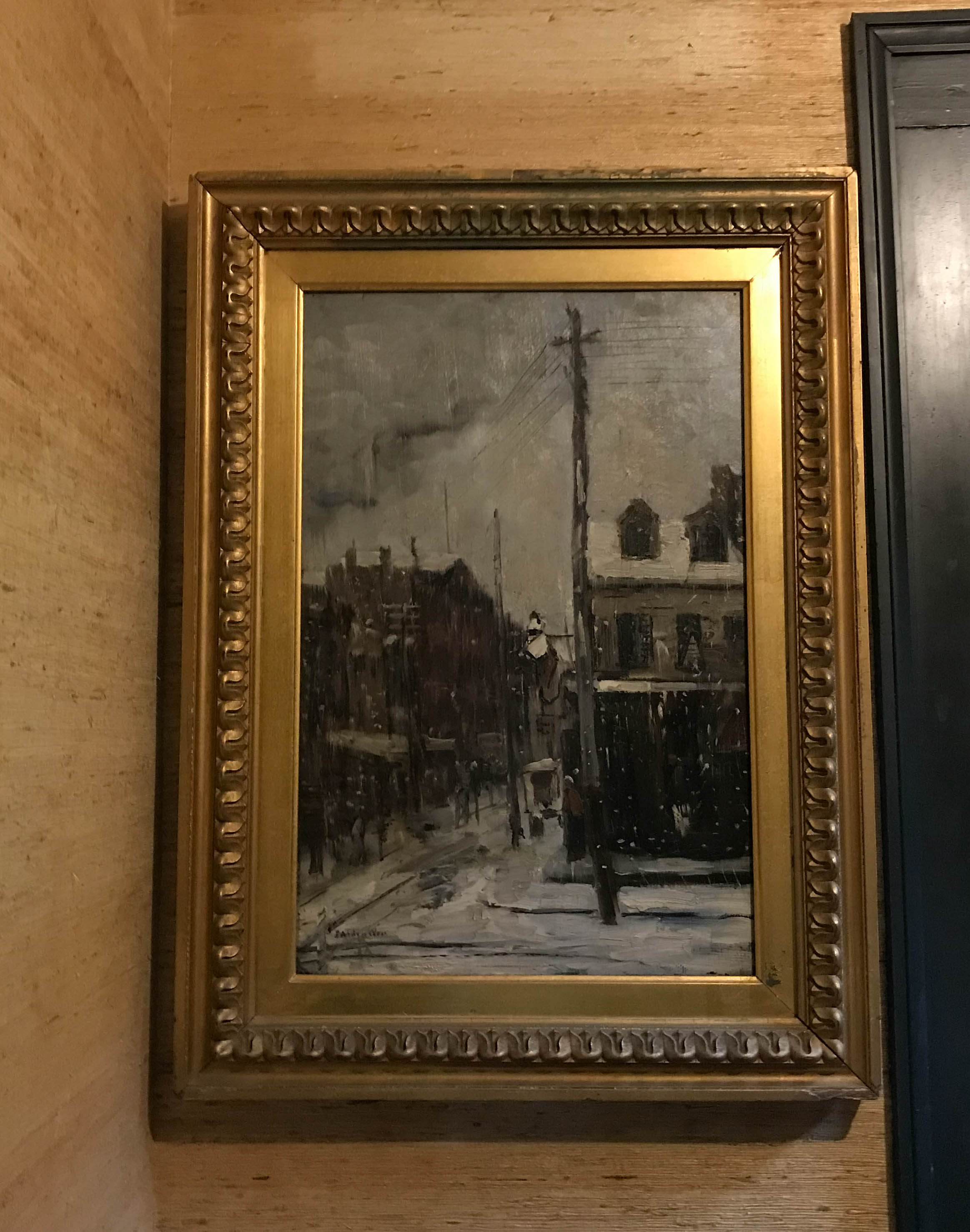 Painting of Chicago during winter hanging on a wall