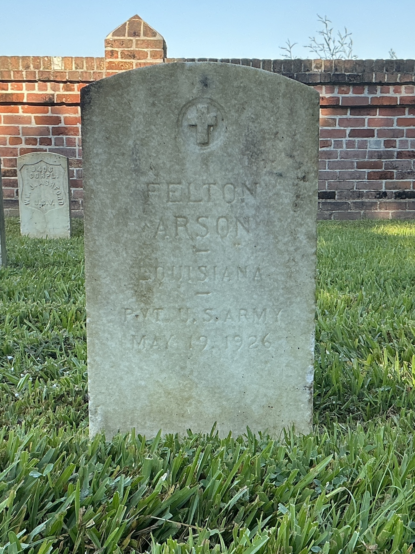 Front of upright marble headstone with flat face.