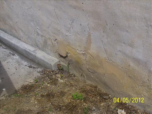 2012 - Views of the deteriorating stucco on the west elevation of the historic John Wilson Building #45 in Lower Town, Harpers Ferry, WV.