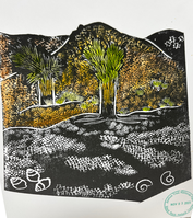 A print of desert landscape.