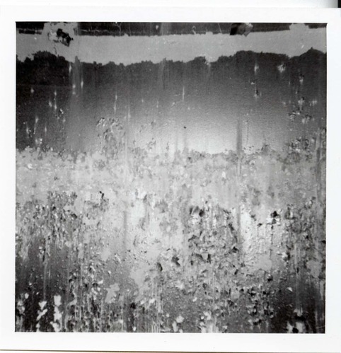 The interior of the 40000 gallon water tank showing buildup/corrosion.