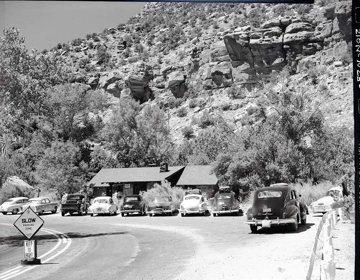 Zion Museum at Canyon Junction with vehicles parked in front.