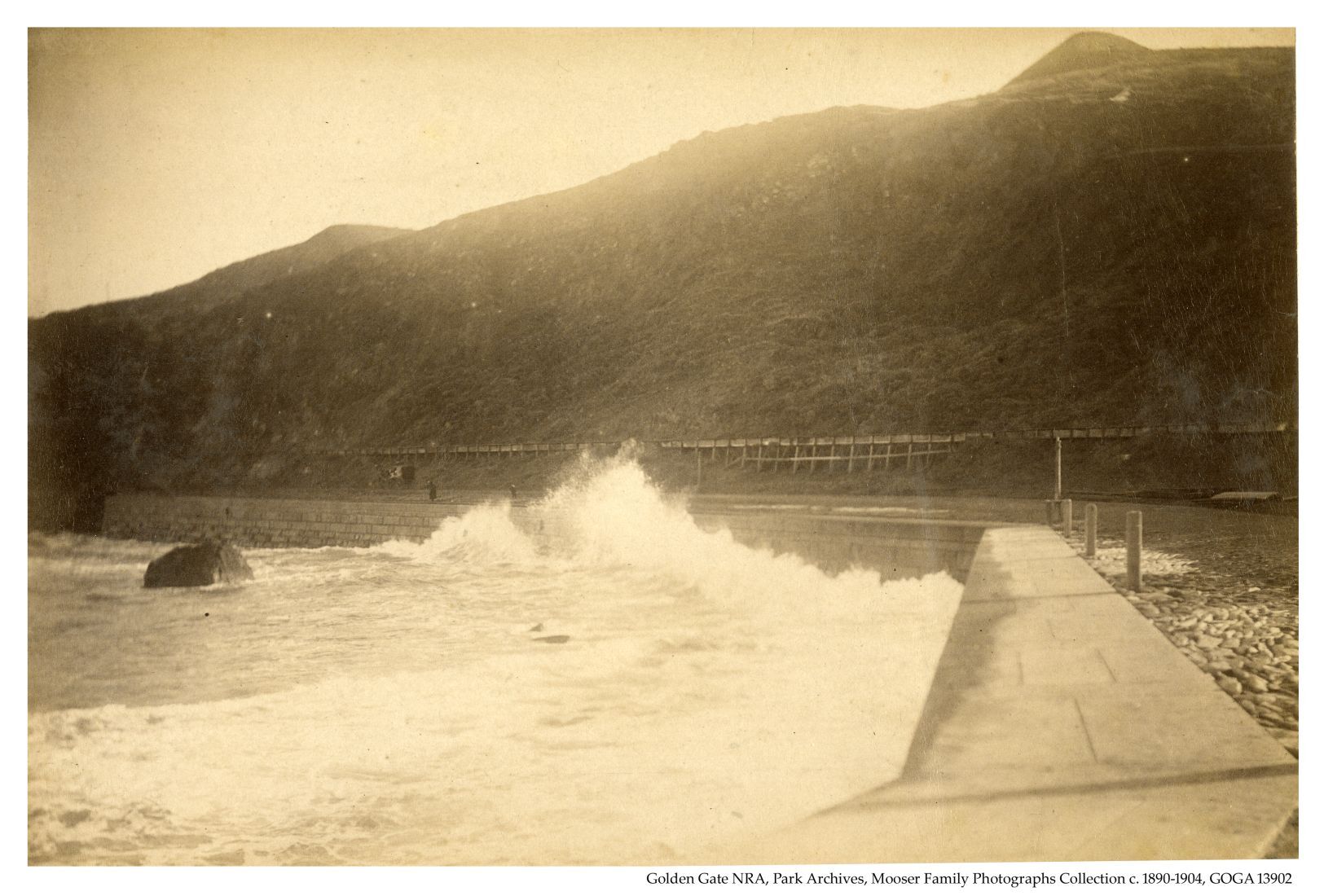 Waves crashing at Fort Point Seawall, 1890.