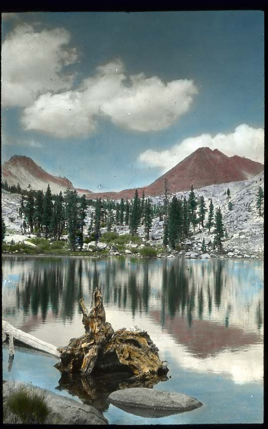 painted slide of mountain and lake
