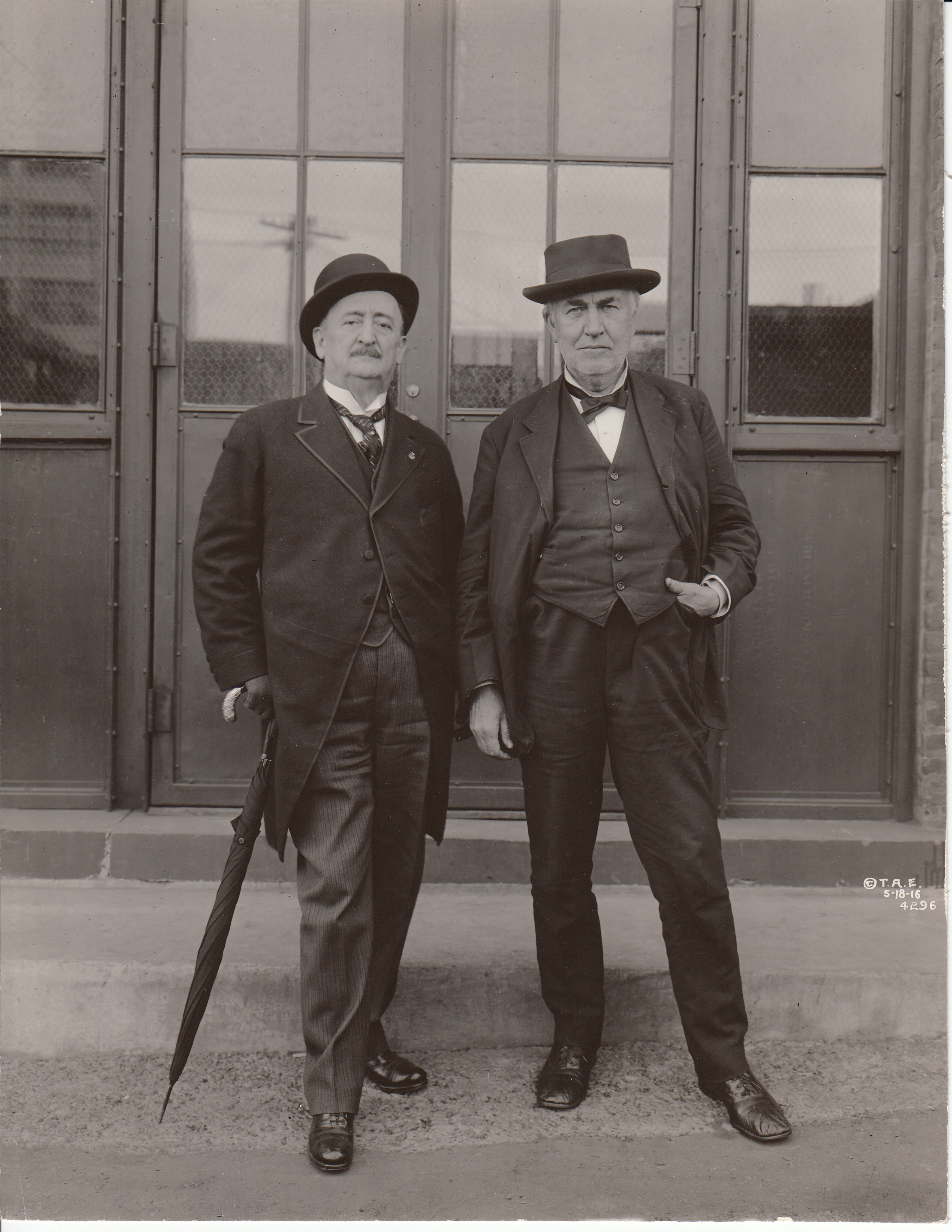 Mr. Francisco Madero Hernandez Sr. and Thomas Edison in front of the Building 5 entrance at Edison's West Orange Laboratory.