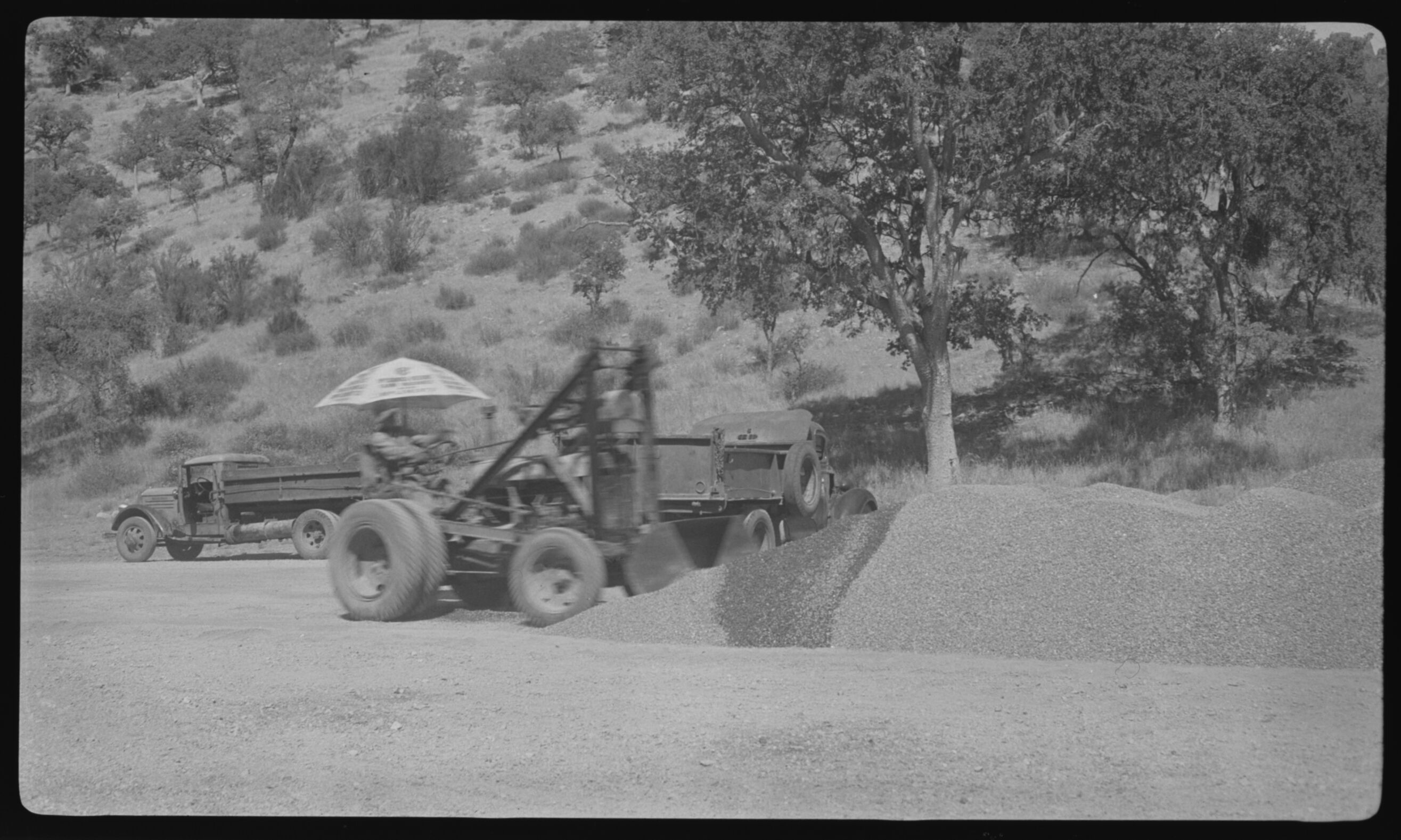 Tractor Moving Gravel