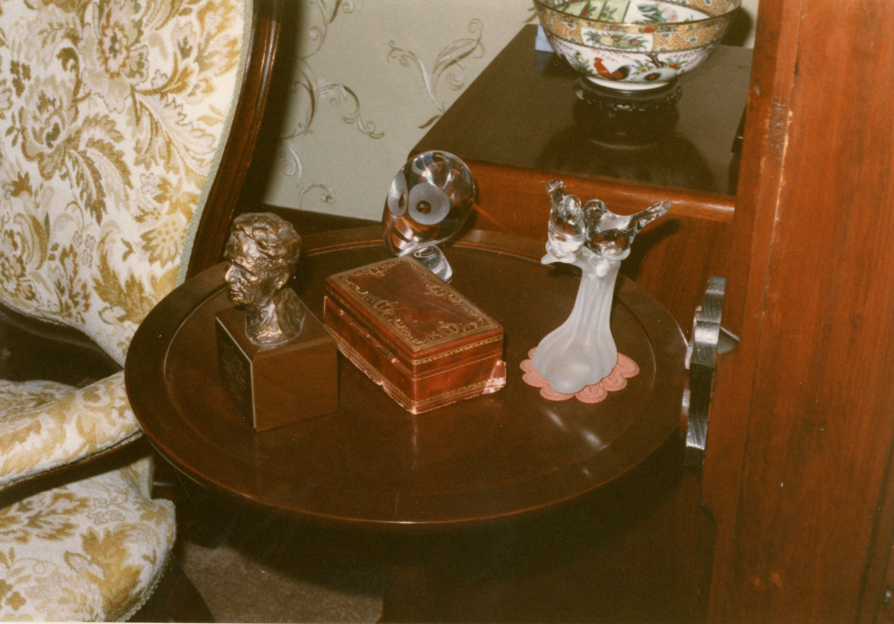 Small round table in southern end of music room