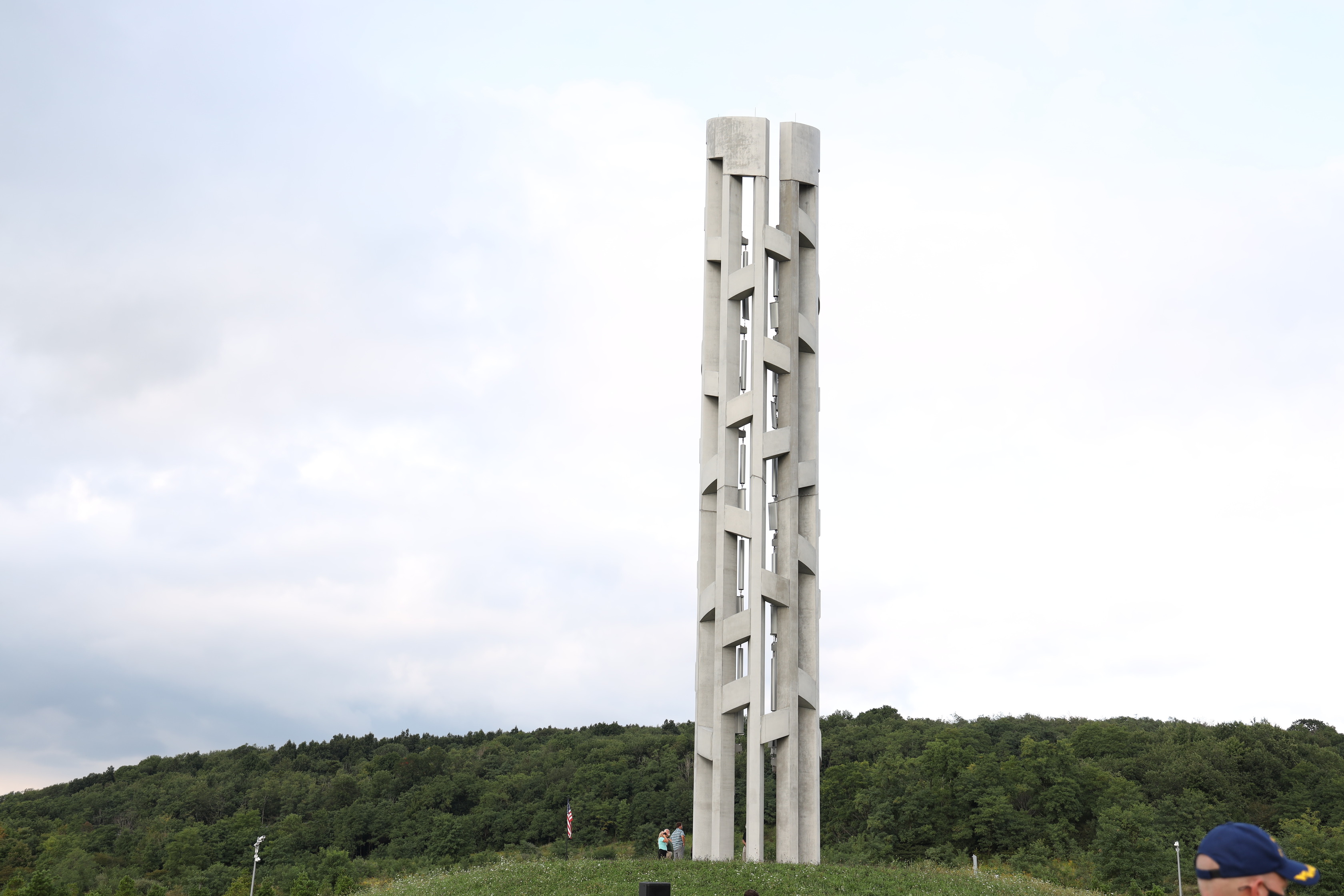 Tower of Voices stands above a small crowd.