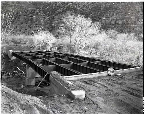 Oak Creek Bridge Construction showing steel spans in place, a significant development for Feb 1960.