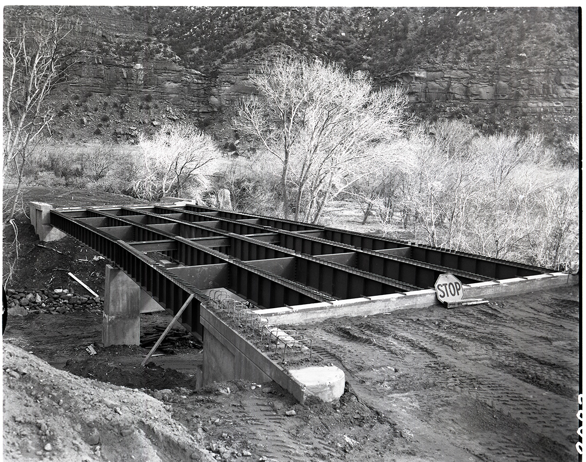 Oak Creek Bridge Construction showing steel spans in place, a significant development for Feb 1960.