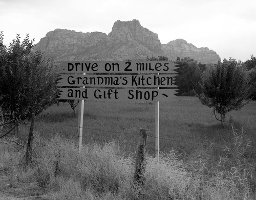 The black on yellow Grandma's signs along State Route 15 (now State Route 9) south of Springdale. Signs were at every turn and straight-a-way from Virgin, Utah to the park's South Entrance. These photos were used as documentation for the proposed clean up project to remove all undesirable signs and debris along the main access route to Zion National Park.