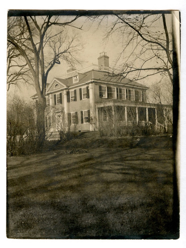 Black and white photograph of Georgian mansion.