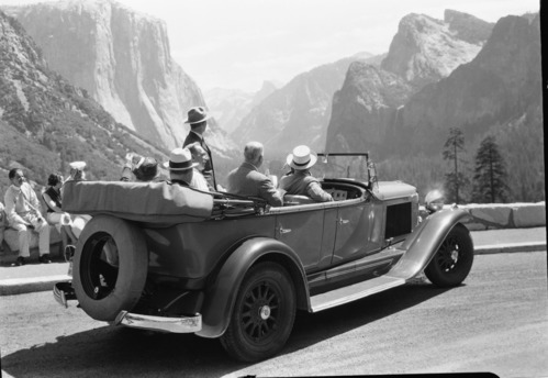 Governor's Party in NPS car #101 at east portal of Wawona Tunnel. Front seat: Col. C. G. Thomson, Supt. & Sec. Georger Dern (Sec. of War). Middle Seat: Gov. Theodore Green of Rhode Island & Gov. James Rolph of Calif. Back Seat: Mrs. Dern & Gov. Ibra C. Blackwood of South Carolina.