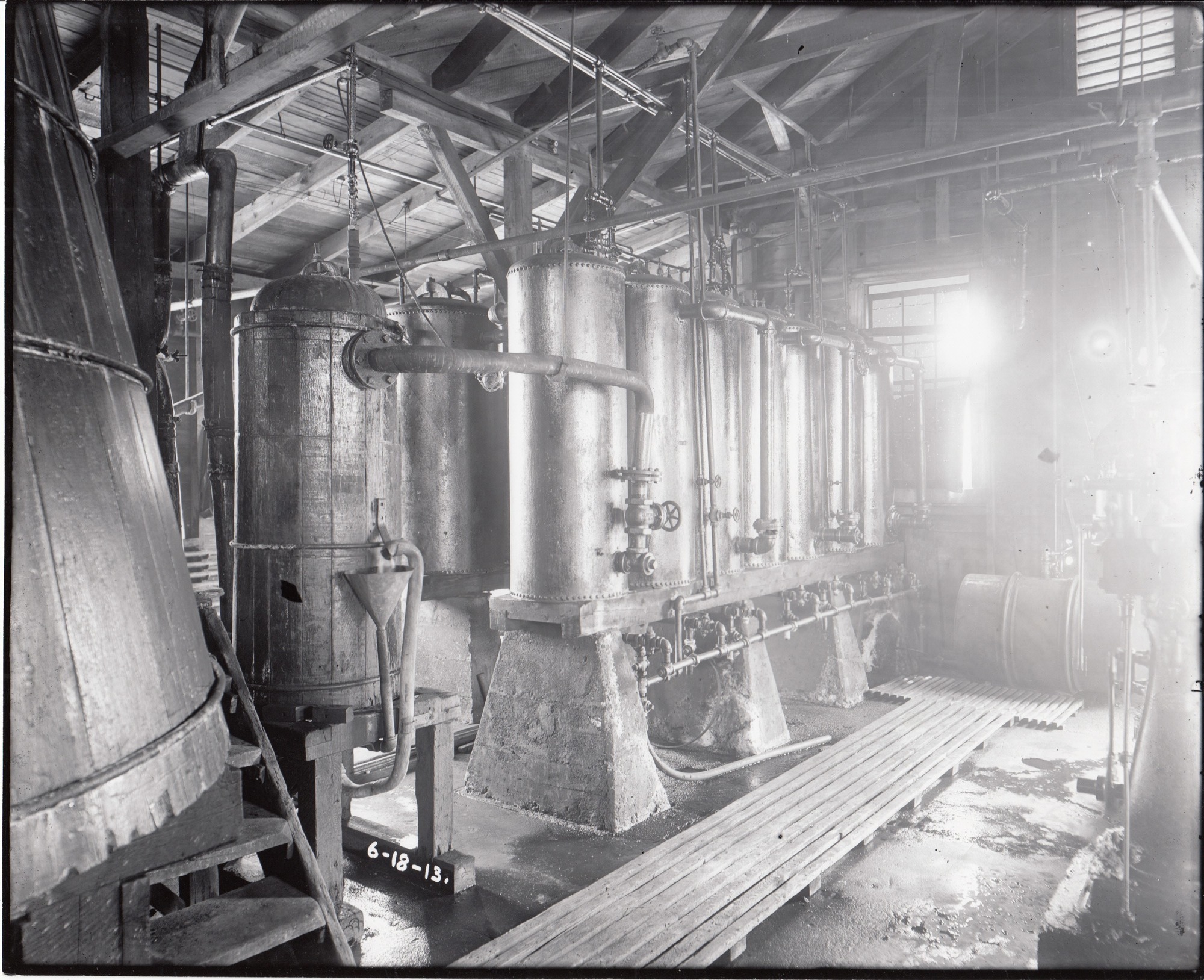 Hydrogen tanks inside building at chemical works.