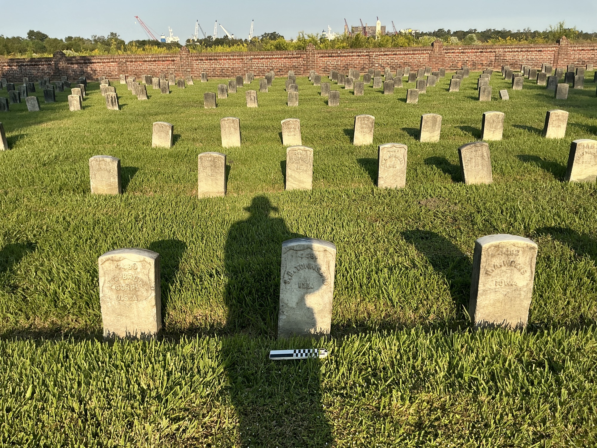 Extra image of historic upright marble headstone with recessed shield face.