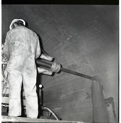 Machinery and operator drilling test cores in Zion-Mt. Carmel tunnel.