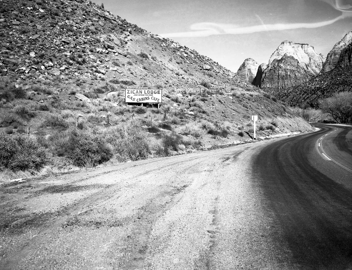 Roadside signs in Springdale. Zican Lodge