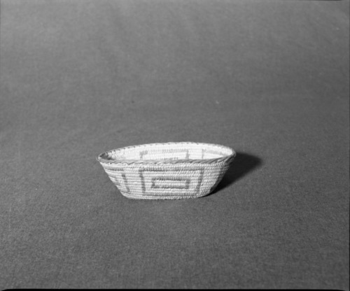 Marie Rozier Collection, Catalog No. 209. Object: Pima basket. Dimensions: 7 1/4 x 4 1/2 x 2 1/4". Materials: willow, devil's claw, cattail stem. Technology: herringbone rim finish. Collection History: Acquired from Mary Long. Originally in Cutting Collection. Photographed by Michael Dixon, Dec. 1982. Catalogued by Craig Bates and Barbara Beroza. Yosemite Collections, National Park Service.