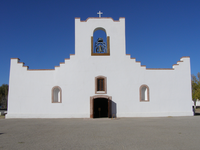 A white church with a bell tower.