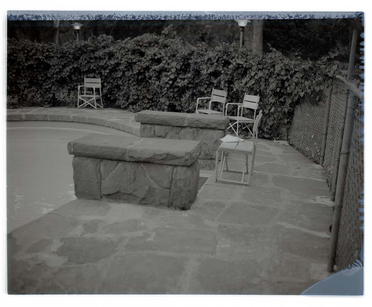 Lounge chairs alongside the pool at Zion Lodge.