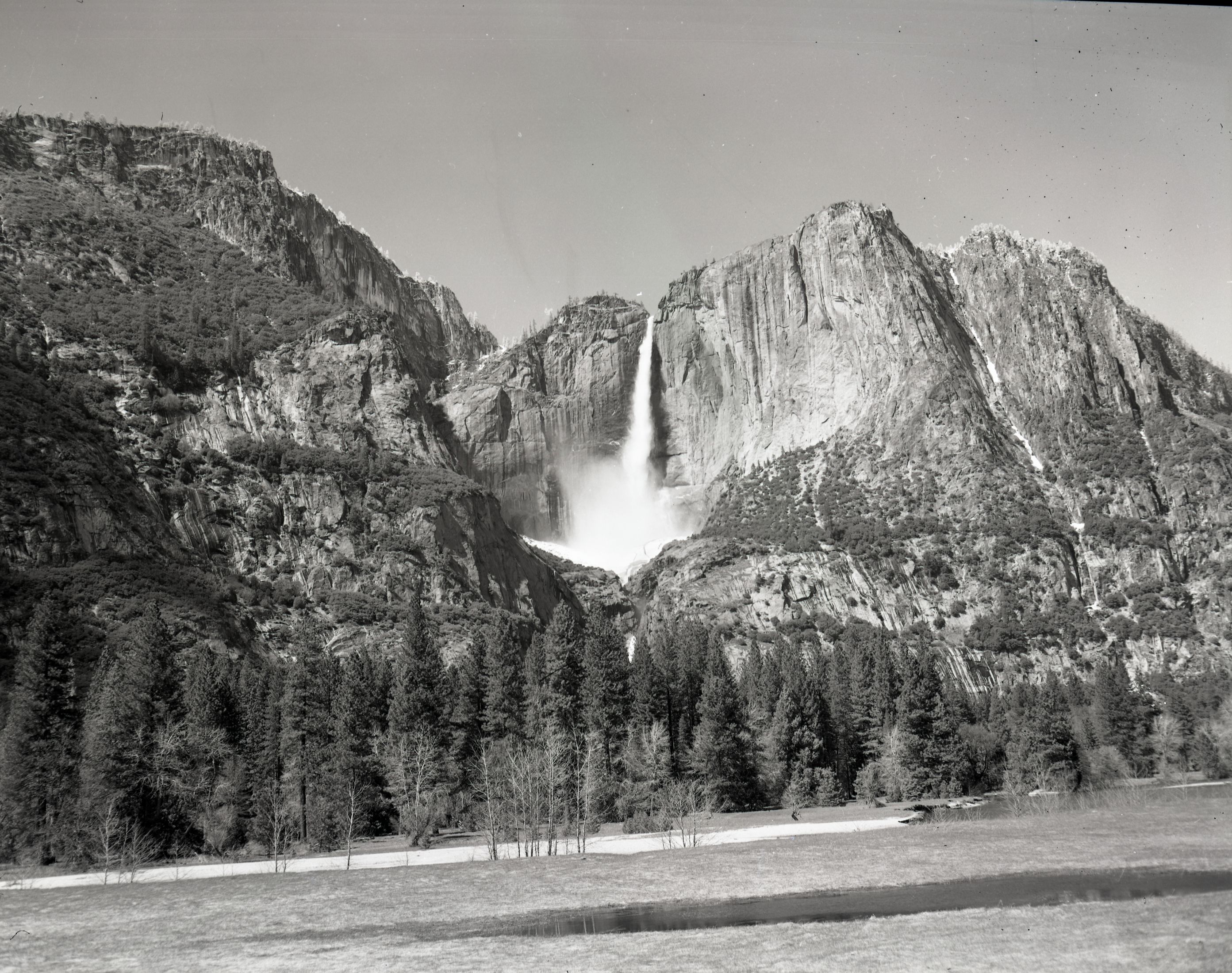 Upper Yosemite Fall from road side west of Chapel. Record demise of snow cone.