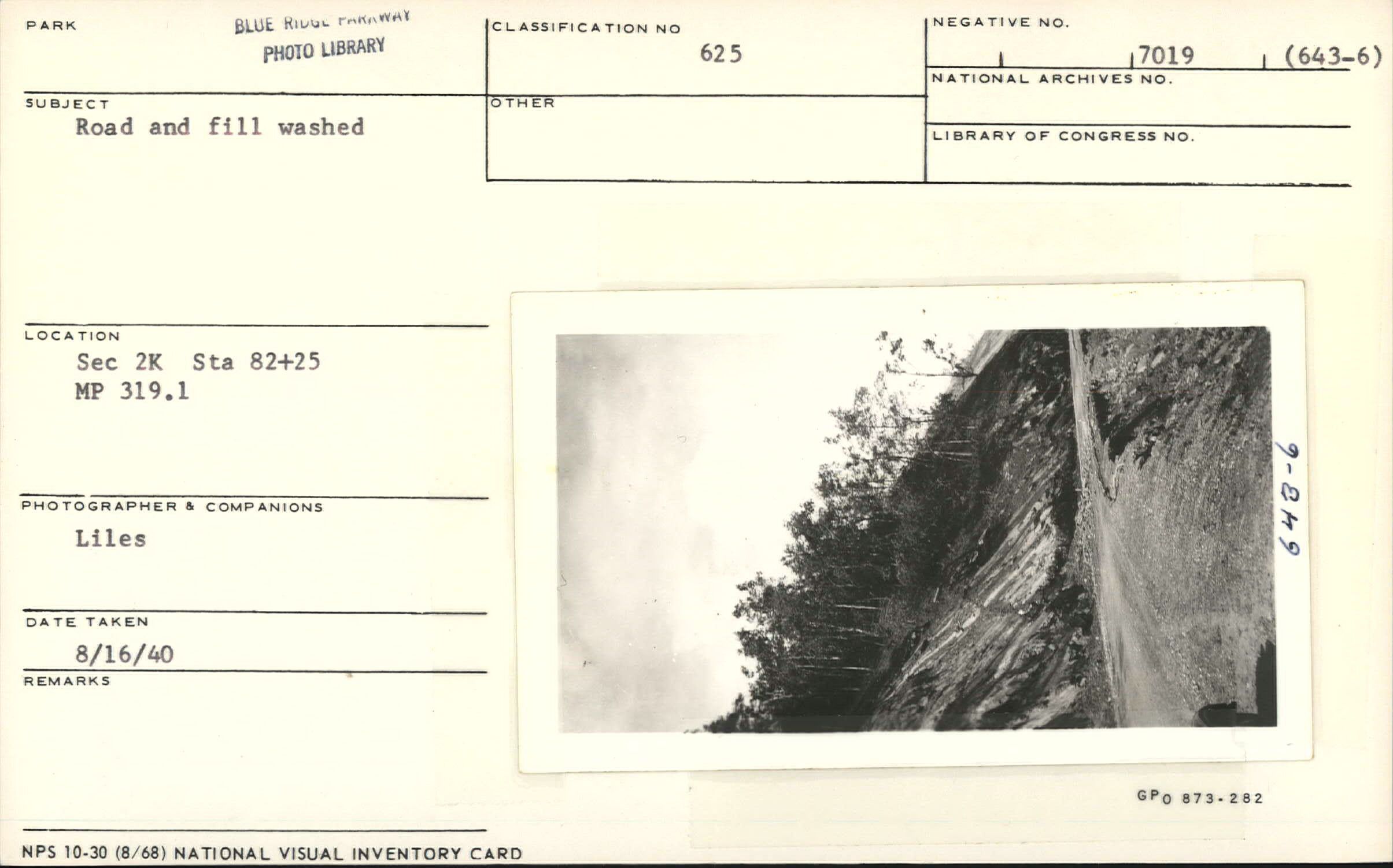 Road and fill washed by flood damage