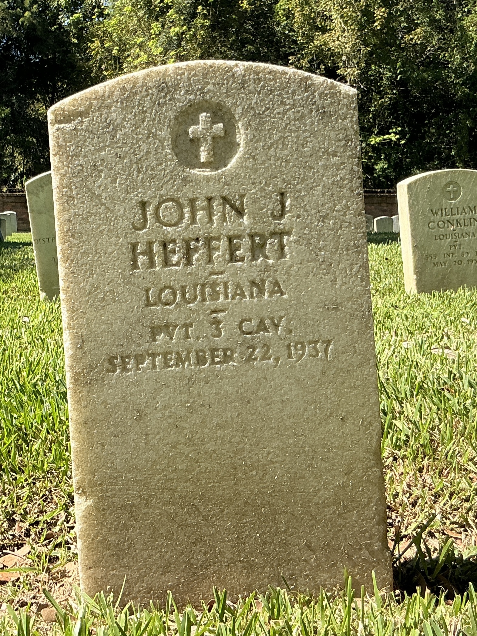 Front of upright marble headstone with flat face.