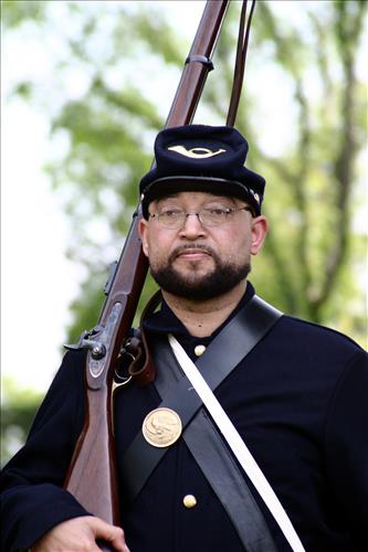 Portaits of Civil War interpreters of U.S. Colored Troops with their rifles at Stones River National Battlefield, April 2004