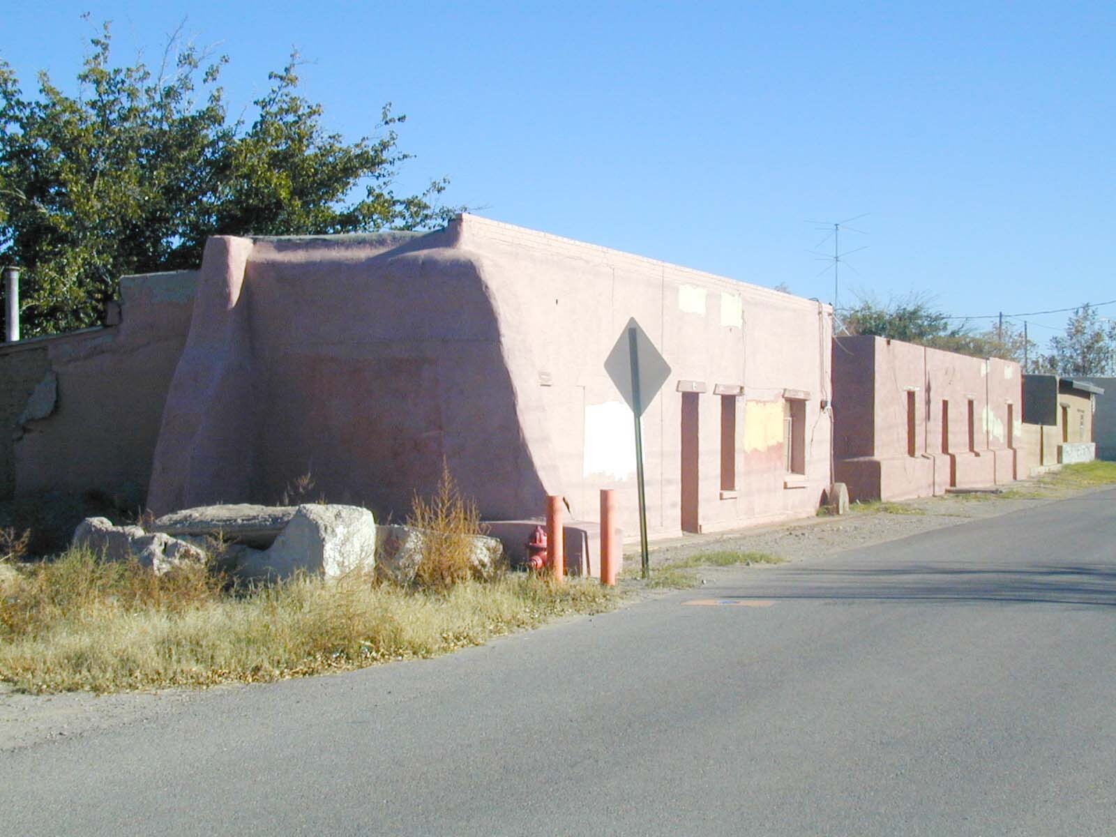 A side street of abandoned properties in Dona Ana, NM