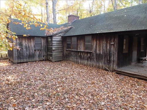 Paint/Stain Historic Structures in Cabin Camp 4