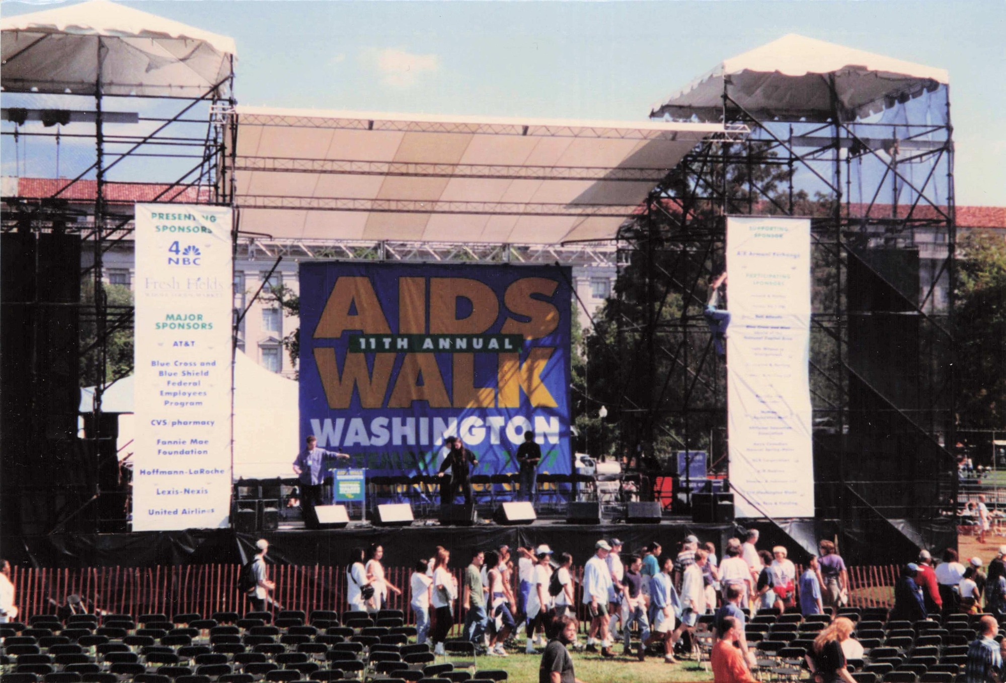 A stage reading "AIDS 11th Annual Walk" 