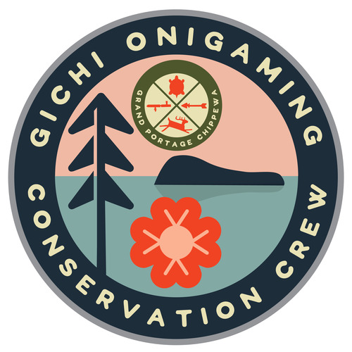 A round insignia design that reads GICHI ONIGAMING CONSERVATION CREW around the edge with landscape symbols in the center.
