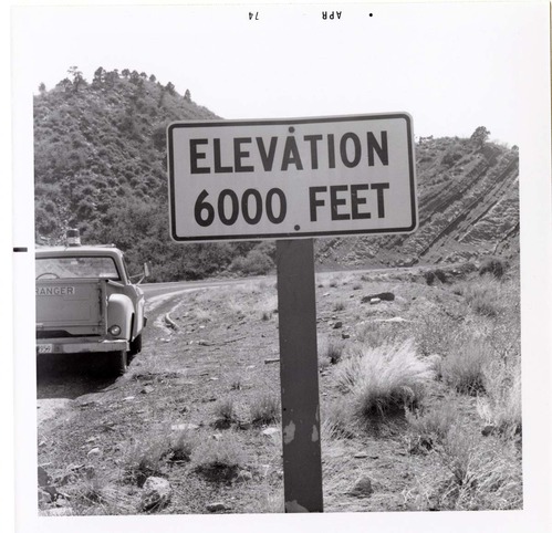Sign reading 'Elevation 6000 Feet' in Kolob Canyon.
