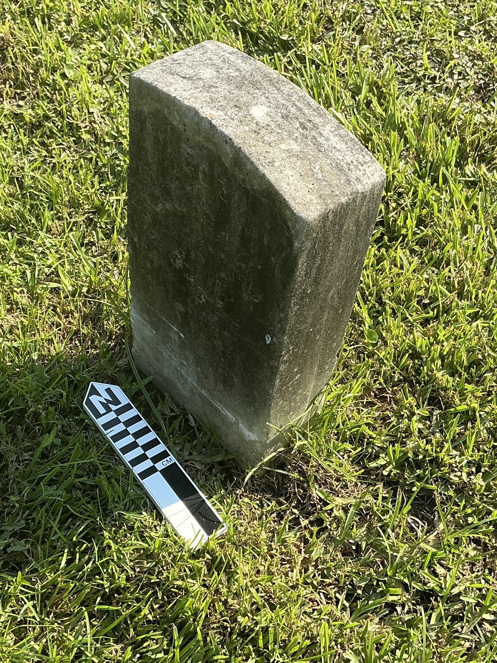 Extra image of historic upright marble headstone with recessed shield face.