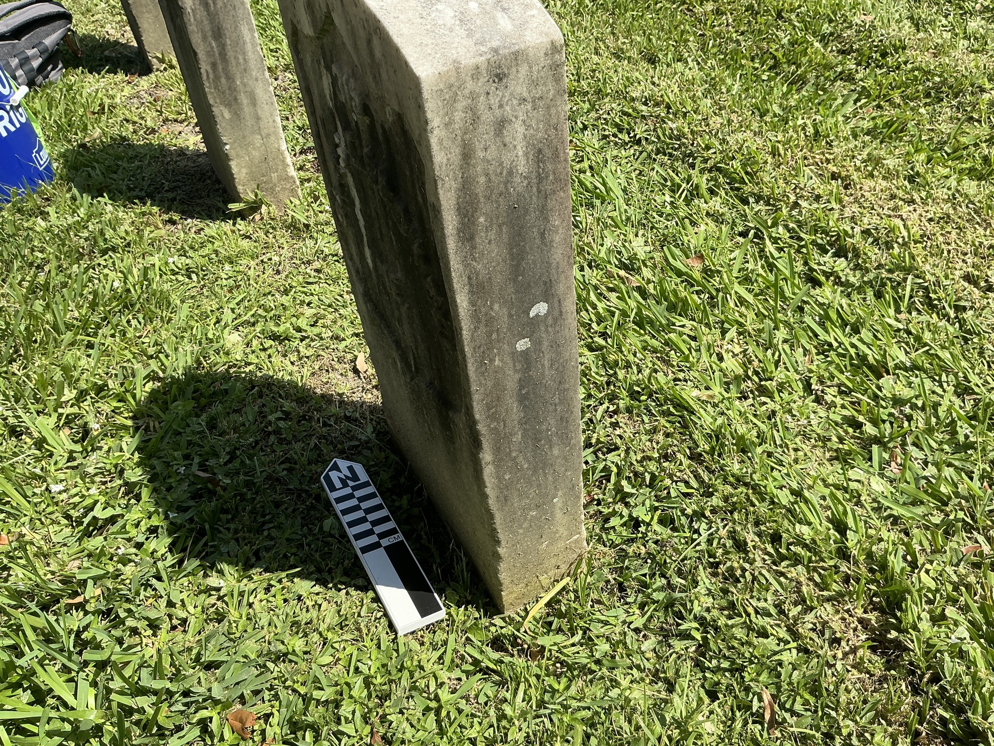 Extra image of historic upright marble headstone with recessed shield face.