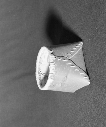 Marie Rozier Collection, Catalog No. ? Object: Shushwap (Salishan) basket. Dimensions: 5 1/2" H. Materials: Birchbark, unidentified root. Collection History: Purchased at Shushwap Lake, Salmon Arm, British Columbia for $7.50. Photographed by Michael Dixon, December 1982. Catalogued by Craig Bates and Barbara Beroza. Yosemite Collections, National Park Service.