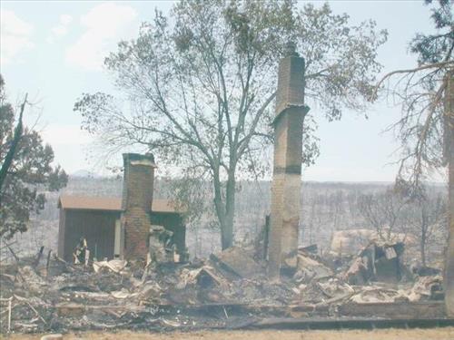Burned houses following the Long Mesa fire, Mesa Verde National Park, August 2002