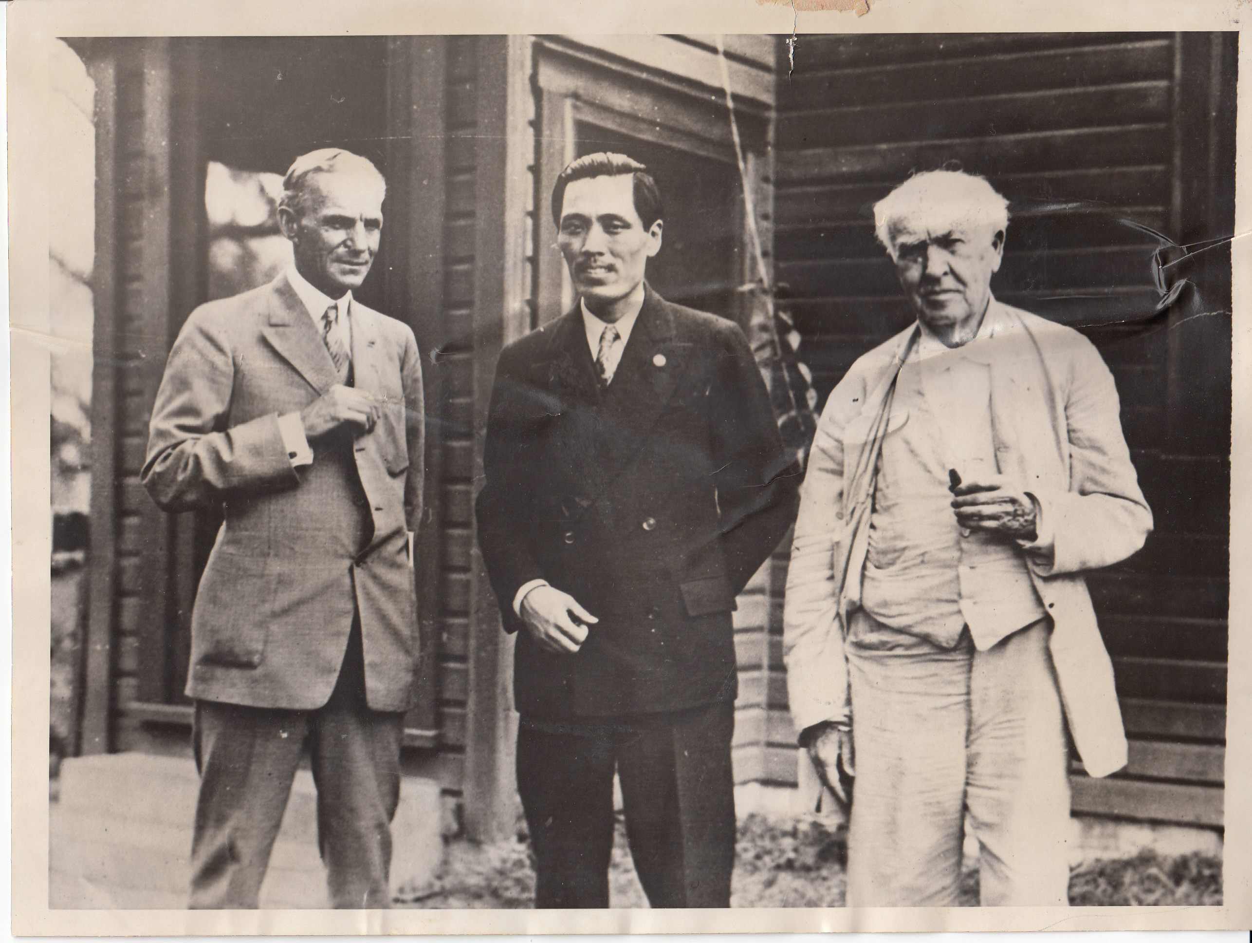 Henry Ford, Tien Lai Huang, and Thomas Edison outside of Edison's rubber laboratory in Fort Myers, Florida.
