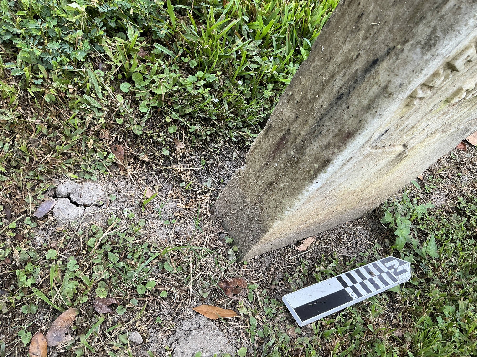 Extra image of historic upright marble headstone with recessed shield face.