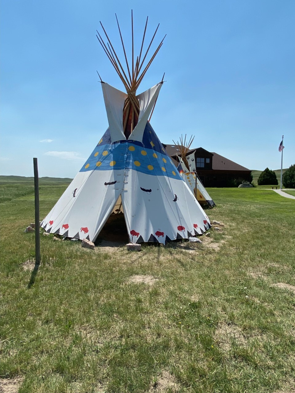 a close up view of the tipi entrance. 