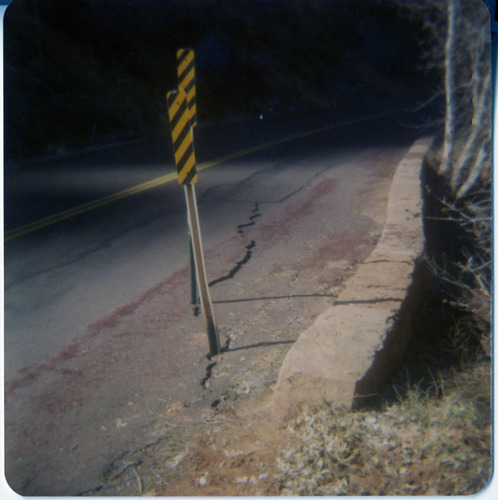 Black and yellow striped construction signs.